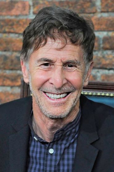 Том Шульман