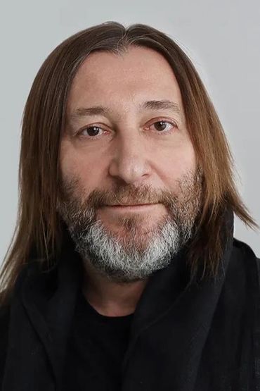 Александр Уман