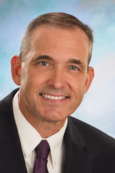 Грег Пакетт