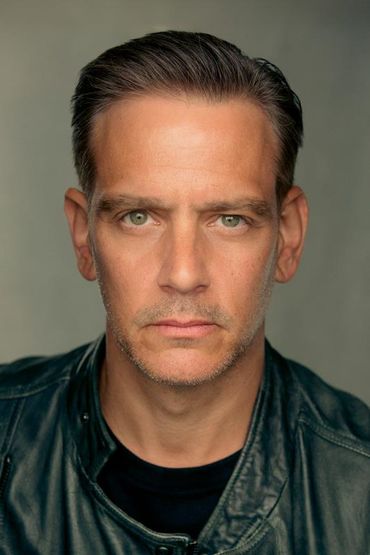 Скотт Логан