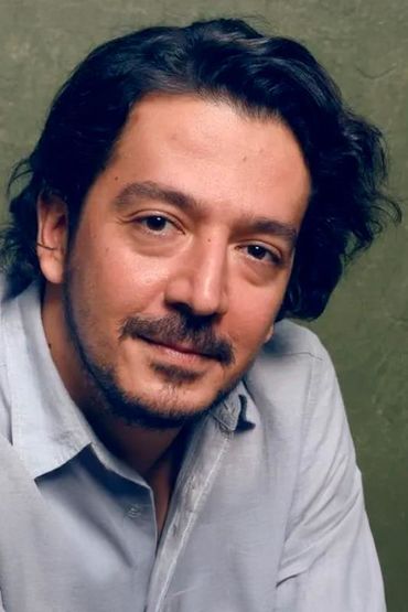 Толга Карачелик