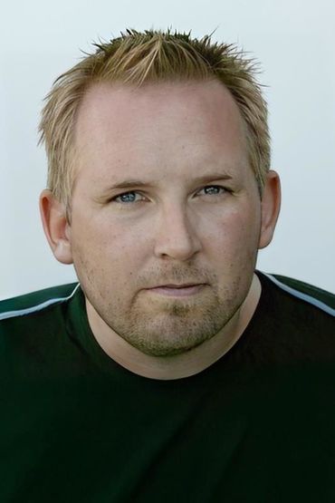 Грег Штраус