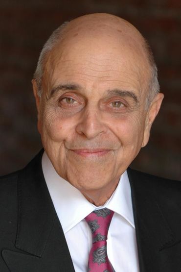 Джино Конфорти